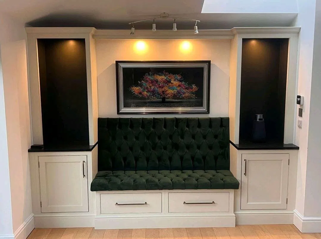 Deep green tufted upholstered bench seat