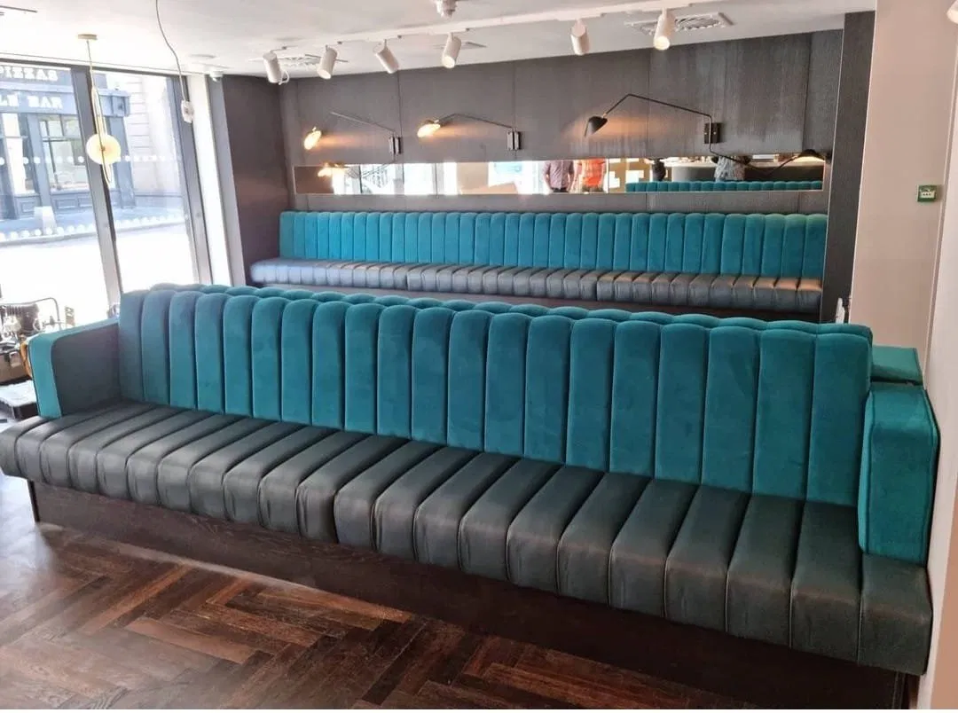 Teal channel-stitched commercial banquette seating
